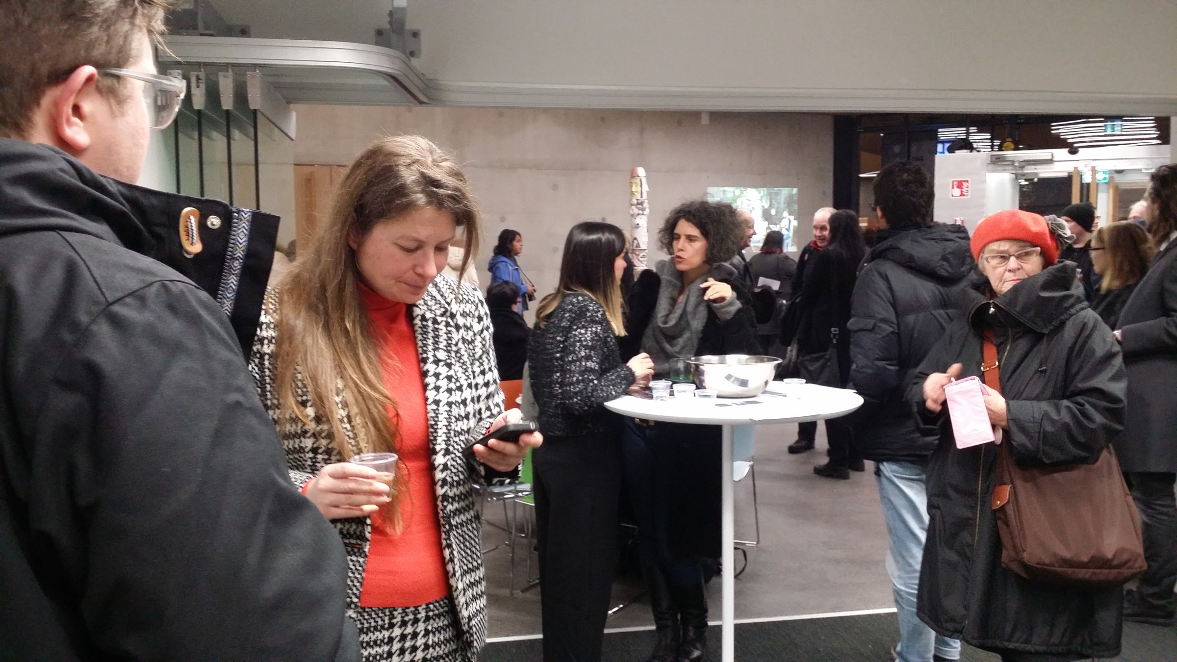 Exhibition opening, audience at Maunula House