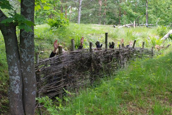 Martial Law at Patterimäki park hands up behind a fence